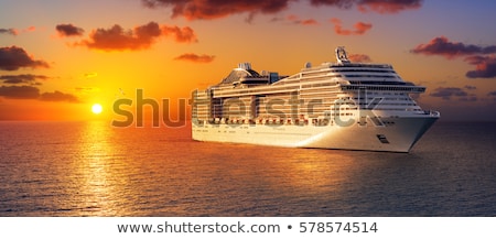 cruise-sunset-ocean-450w-578574514.jpg