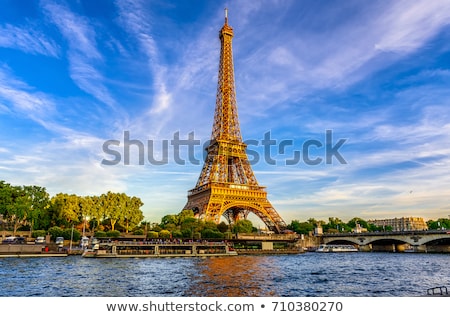 paris-eiffel-tower-river-seine-450w-710380270.jpg
