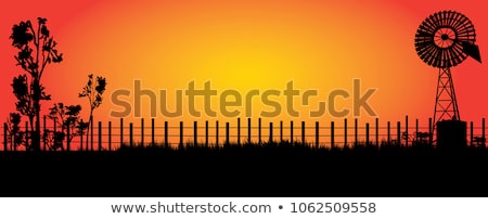 silhouette-wind-mill-outback-bright-450w-1062509558.jpg